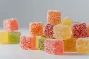 Close up hybrid gummy candies with sugar coating